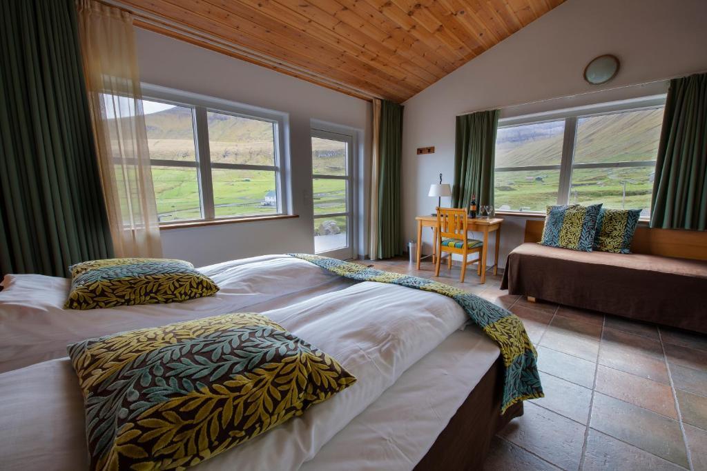 Gjaargardur Guesthouse Gjógv Quarto foto